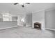 Spacious living room with fireplace and carpet at 3044 Lauren Parc Rd, Decatur, GA 30032