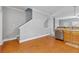 Open-concept area with stainless appliances and stairs leading to the upper level at 3044 Lauren Parc Rd, Decatur, GA 30032
