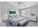 Tranquil main bedroom with a sloped ceiling, a king bed and coordinated decor at 3044 Lauren Parc Rd, Decatur, GA 30032