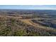 Wide shot of property showing house location within larger landscape at 159 Geneva Rd, Canton, GA 30114