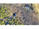 Aerial view of house and driveway, surrounded by trees at 159 Geneva Rd, Canton, GA 30114