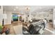 Finished basement with gray flooring, sectional sofa, and large TV at 159 Geneva Rd, Canton, GA 30114