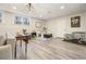 Finished basement with seating, game table, and dog crates at 159 Geneva Rd, Canton, GA 30114