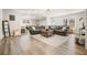 Spacious basement living area with sectional sofa and large windows at 159 Geneva Rd, Canton, GA 30114
