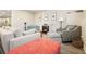 Cozy basement sitting area with fireplace and comfortable seating at 159 Geneva Rd, Canton, GA 30114