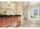 Elegant bathroom boasting granite countertops and a spacious shower at 159 Geneva Rd, Canton, GA 30114