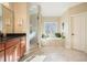 Luxurious bathroom with soaking tub, walk-in shower, and granite vanity at 159 Geneva Rd, Canton, GA 30114