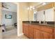 Shared bathroom with double vanity and granite countertops at 159 Geneva Rd, Canton, GA 30114