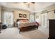 Large main bedroom with plush carpet and ample natural light at 159 Geneva Rd, Canton, GA 30114
