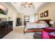 Bright bedroom featuring a comfortable bed and plenty of storage at 159 Geneva Rd, Canton, GA 30114