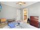 Bedroom with double bed, access to bathroom, and wood furniture at 159 Geneva Rd, Canton, GA 30114