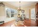 Bright breakfast nook with hardwood floors and charming window at 159 Geneva Rd, Canton, GA 30114