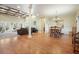 Bright dining room features hardwood floors and a charming chandelier at 159 Geneva Rd, Canton, GA 30114