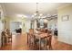 Spacious dining room with hardwood floors and view into living room at 159 Geneva Rd, Canton, GA 30114