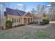 Two story home with a covered porch and landscaping at 159 Geneva Rd, Canton, GA 30114