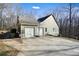 Two-car garage with additional driveway space and basketball goal at 159 Geneva Rd, Canton, GA 30114