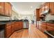 Spacious kitchen with hardwood floors and an island at 159 Geneva Rd, Canton, GA 30114