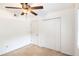 Bright bedroom with ceiling fan and neutral carpeting at 6940 Roswell Rd # 16B, Atlanta, GA 30328