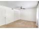 Bright bedroom with neutral walls and carpet at 6940 Roswell Rd # 16B, Atlanta, GA 30328