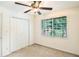 Spacious bedroom with double door closet and ceiling fan at 6940 Roswell Rd # 16B, Atlanta, GA 30328