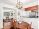 Open dining area with view into living room and kitchen at 6940 Roswell Rd # 16B, Atlanta, GA 30328