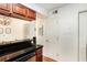 Modern kitchen with dark countertops and stainless steel appliances at 6940 Roswell Rd # 16B, Atlanta, GA 30328