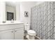 Simple bathroom with white vanity and shower/tub combo at 200 Wallace St, Fayetteville, GA 30214
