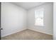 Cozy and bright bedroom with neutral decor at 200 Wallace St, Fayetteville, GA 30214