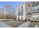Townhome with charming front porch and landscaping at 200 Wallace St, Fayetteville, GA 30214