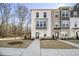 Modern 3-story townhome with white siding and gray accents at 200 Wallace St, Fayetteville, GA 30214