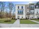 Beautifully built modern townhome with a cozy front yard and a walkway at 200 Wallace St, Fayetteville, GA 30214