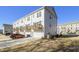 Townhome community showcasing modern design and wooded views at 200 Wallace St, Fayetteville, GA 30214