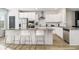 Modern kitchen with white cabinets, stainless steel appliances, and an island at 200 Wallace St, Fayetteville, GA 30214