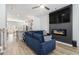 Spacious living room featuring a fireplace and large TV at 200 Wallace St, Fayetteville, GA 30214