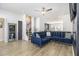 Open living room featuring a sectional sofa and hardwood floors at 200 Wallace St, Fayetteville, GA 30214