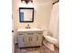 Updated bathroom with new vanity and fixtures at 305 Berkeley Woods Dr, Duluth, GA 30096