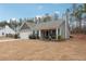 One story home with gray siding, attached garage, and partially visible grilling area at 218 Cynthia Ct, Dallas, GA 30157