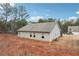Rear view of house, showcasing yard and siding at 218 Cynthia Ct, Dallas, GA 30157