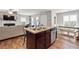 Kitchen features an island, stainless steel appliances, and hardwood floors at 218 Cynthia Ct, Dallas, GA 30157