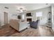 Living area with hardwood floors, a fireplace and neutral colored furniture at 218 Cynthia Ct, Dallas, GA 30157
