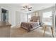 Main bedroom with window, ceiling fan, and dresser at 218 Cynthia Ct, Dallas, GA 30157