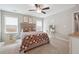 Main bedroom with ceiling fan and dresser at 218 Cynthia Ct, Dallas, GA 30157