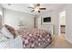 Spacious main bedroom with ceiling fan and large windows at 218 Cynthia Ct, Dallas, GA 30157