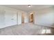 Spacious bedroom with double doors leading to private ensuite bathroom and walk-in closet at 258 Tulip Dr, Covington, GA 30016