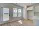 Bright kitchen with view to backyard and access to patio at 258 Tulip Dr, Covington, GA 30016