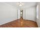 Bright bedroom with hardwood floors, ceiling fan and double door closet at 2773 Townley Cir, Atlanta, GA 30340