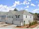 Modern townhome with two-car garage and landscaped front yard at 3576 Silvery Way, Powder Springs, GA 30127