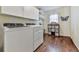 Laundry room with washer, dryer, and ample storage at 4504 Grapevine Ct, Acworth, GA 30102