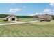 Country home with detached barn, long driveway, and large lot at 615 Henderson Mill Rd, Covington, GA 30014