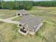 House and detached garage on a large lot with open fields at 615 Henderson Mill Rd, Covington, GA 30014